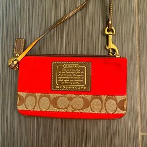 Coach wristlet- orange and brown